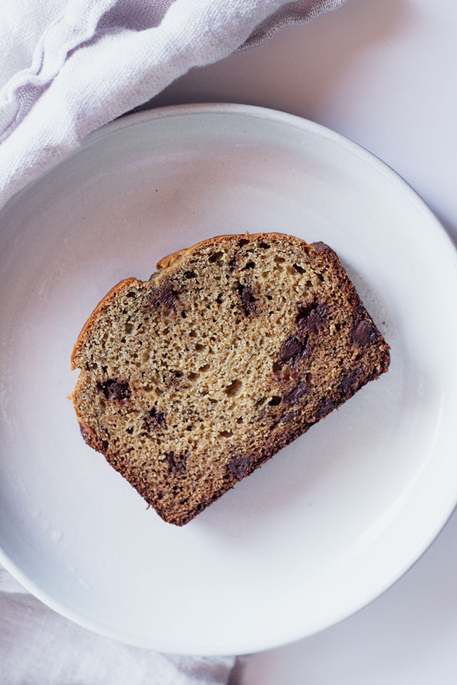 greek yogurt and coconut oil make this loaf incredibly moist.  easy to make and ready for the oven in less than 15 minutes, this healthy chocolate chip banana bread is simply the BEST!!